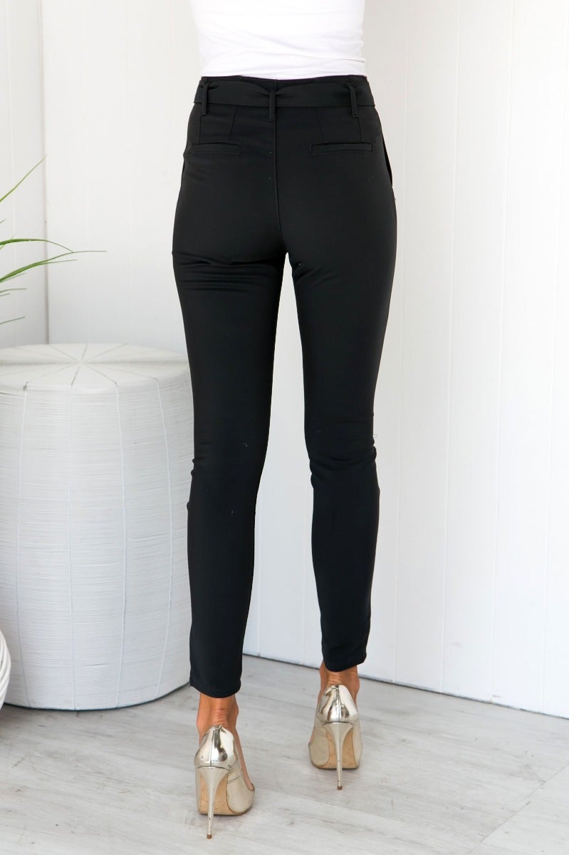 High-waisted black pants with removable belt and faux pockets for a stylish fit.