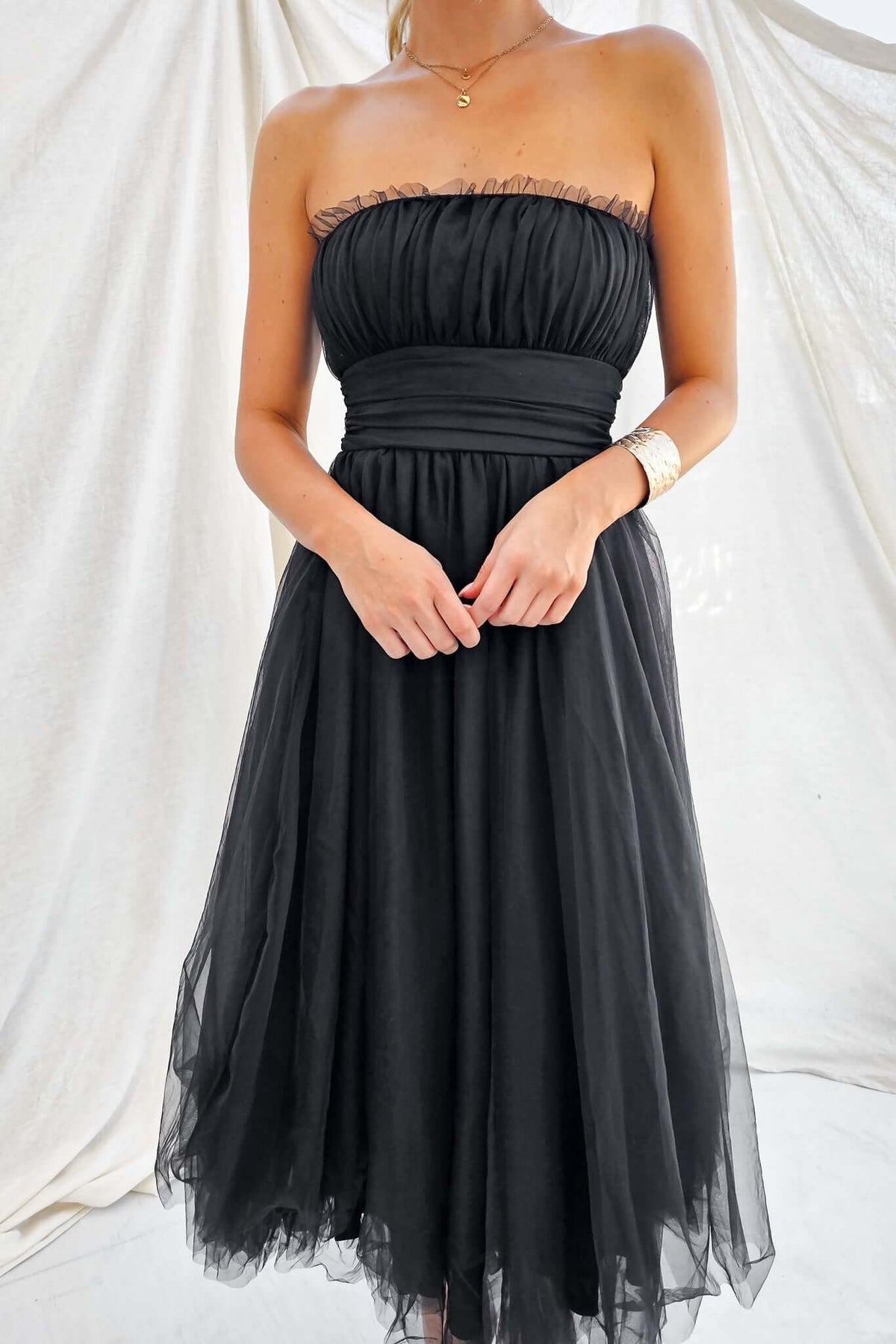 Sweetest Treat Maxi Dress in black tulle, featuring strapless design and anti-slip bust with elegant silhouette.