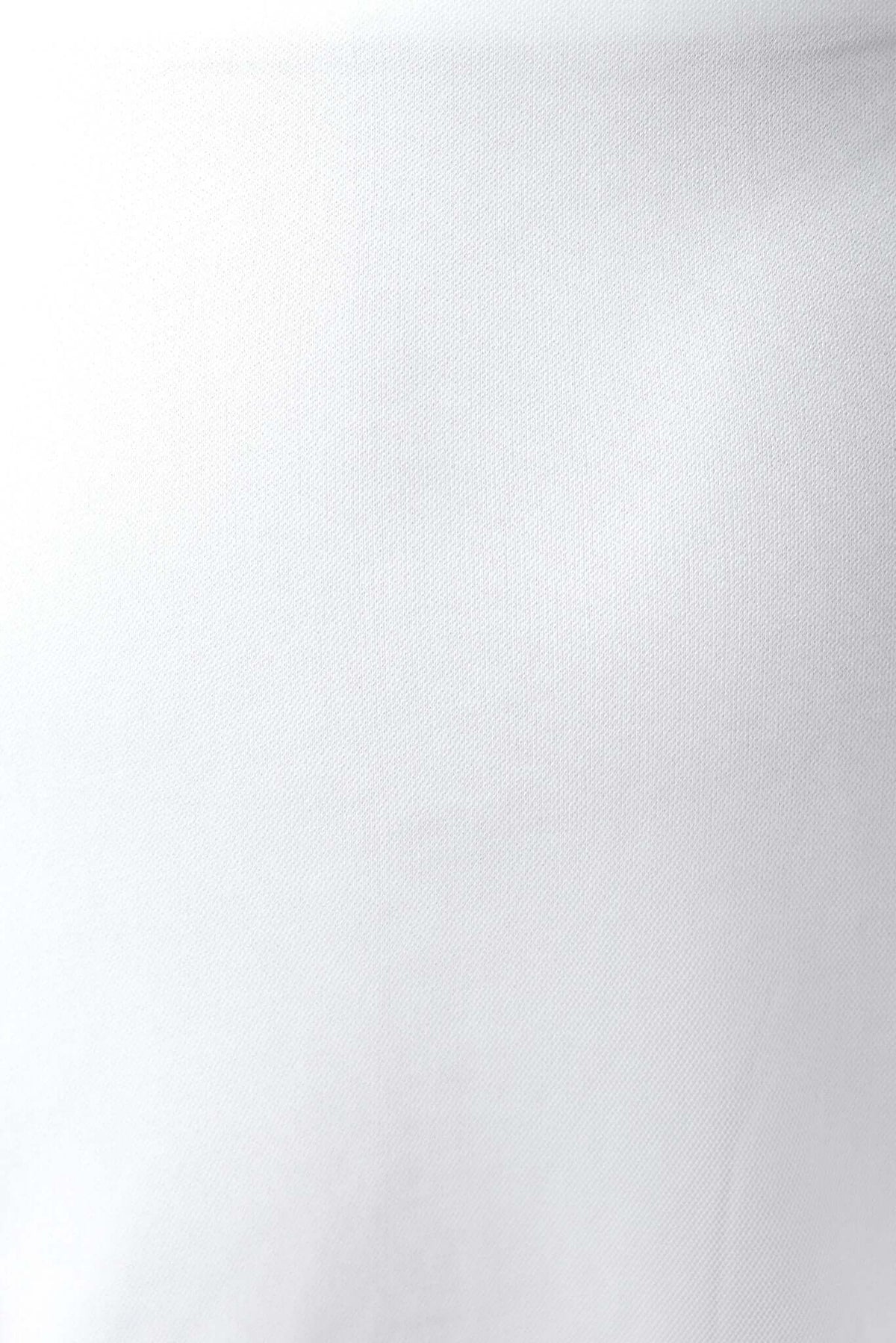 Detail of tulle material for Eleah Maxi Dress by Amaroso Bridal, showcasing its soft texture and elegant finish.