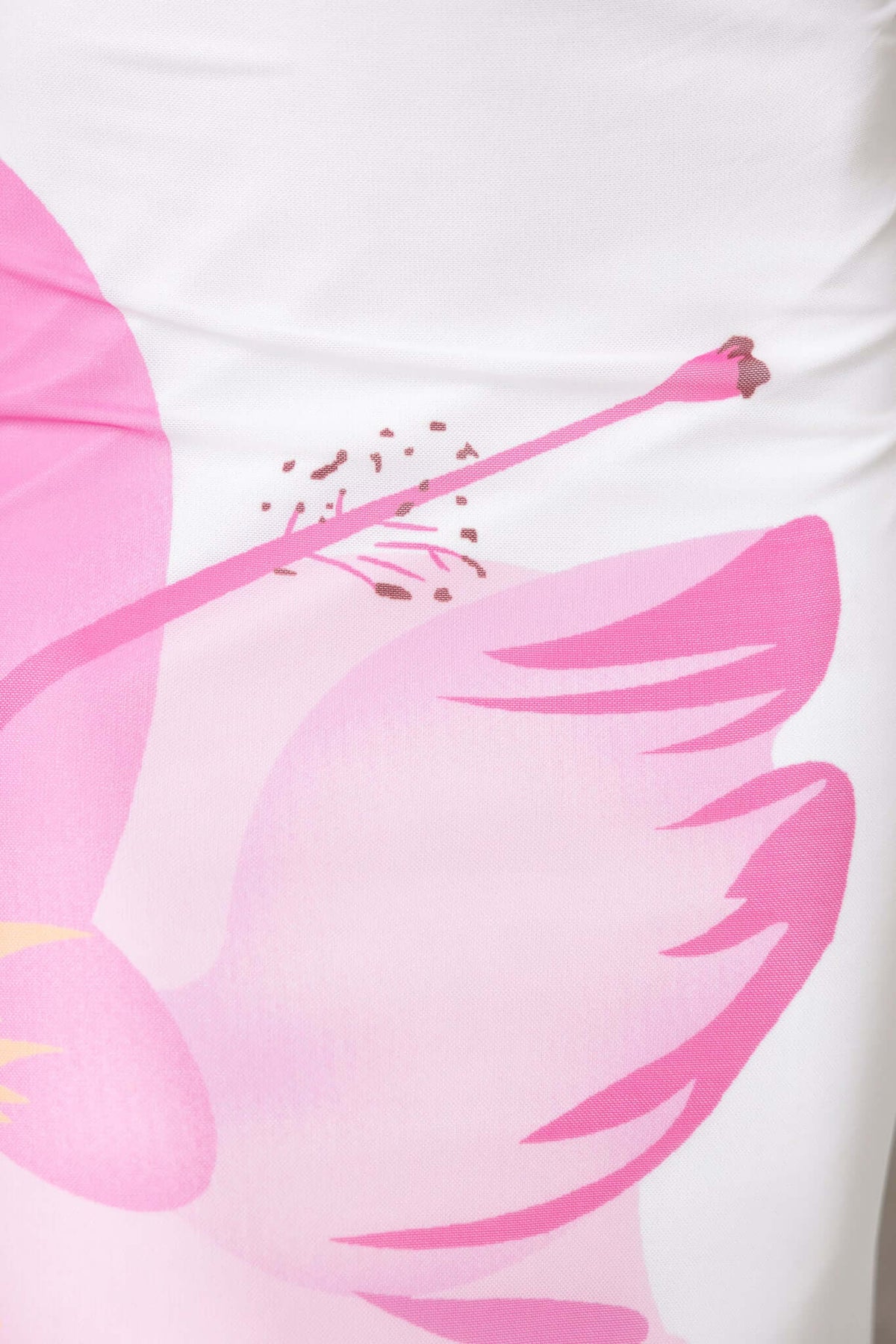 Detailed view of pink floral print on the Meriden Maxi Dress, showcasing a vibrant design and soft texture.