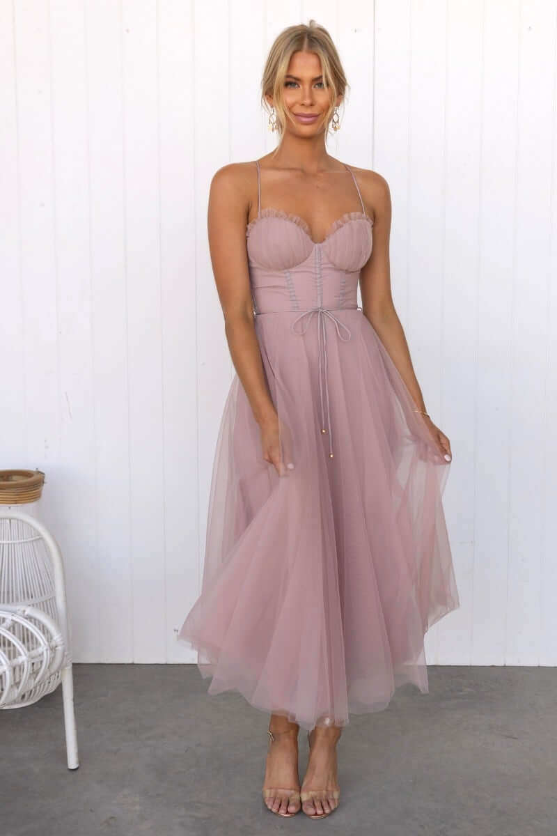 Florence Midi Dress in soft pink tulle, featuring adjustable straps and a removable tie detail.