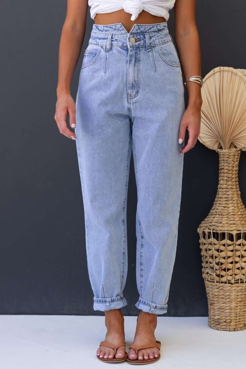 Shaylan Mom Jeans: mid-high waist fit, wide legs, front & back pockets, non-stretch denim in light wash.