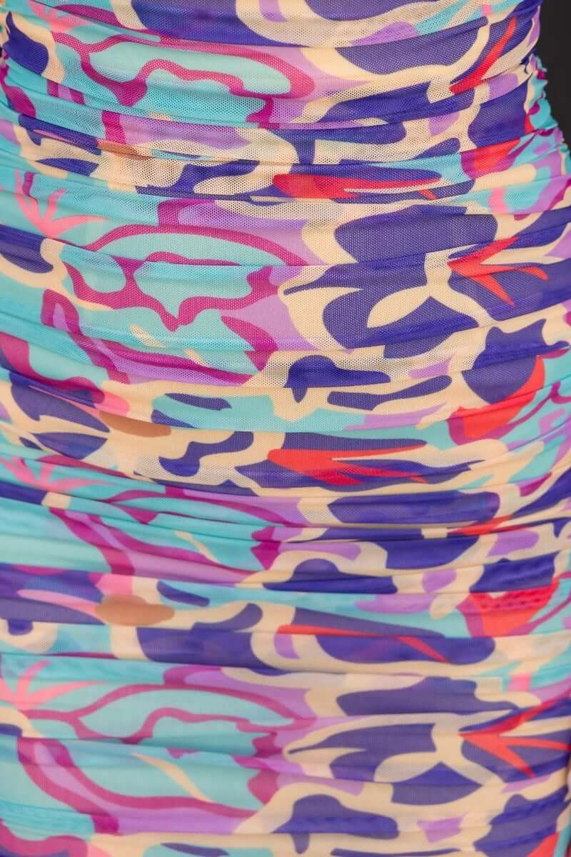 Close-up of the All The Vibes Dress showcasing vibrant multi-colour print and stylish ruching detail.