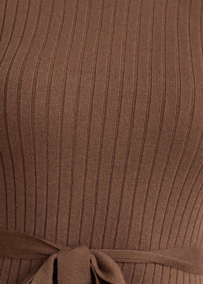 Close-up of ribbed knit fabric in brown with removable belt detail on the Bambia Midi Dress.