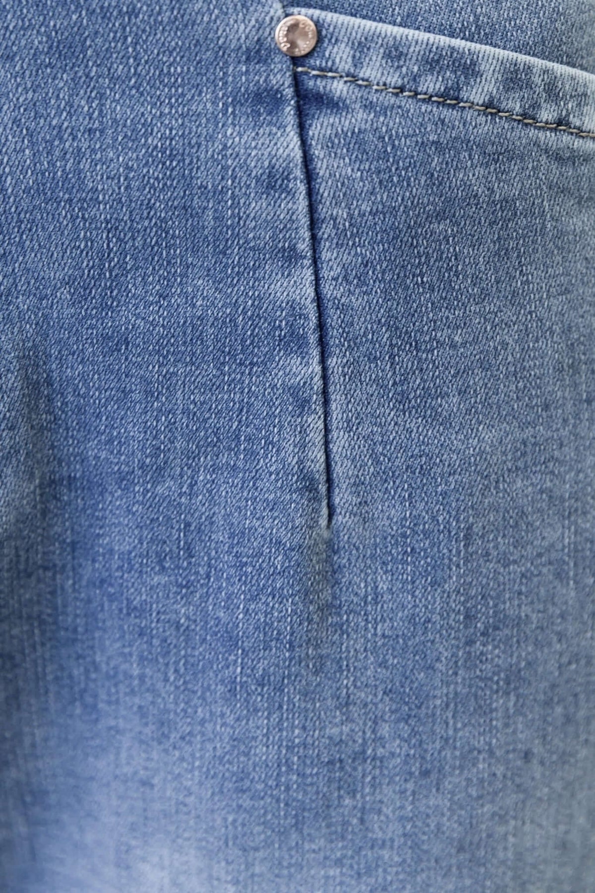 Close-up of the pocket detail on Blanca Jeans, featuring mid-high waist and stretch denim fabric.