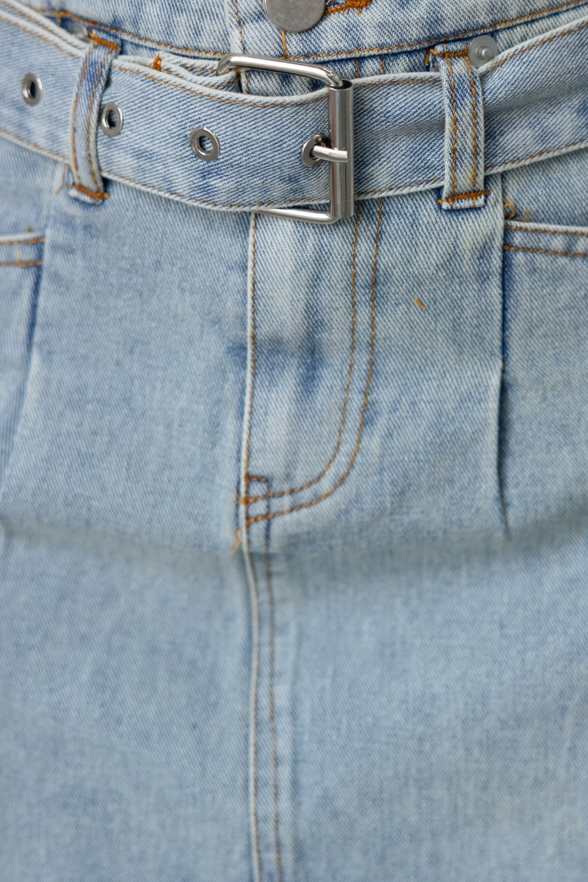 Close-up of Jianna Denim Skirt showing mid-high waist, removable belt, and detailed stitching.