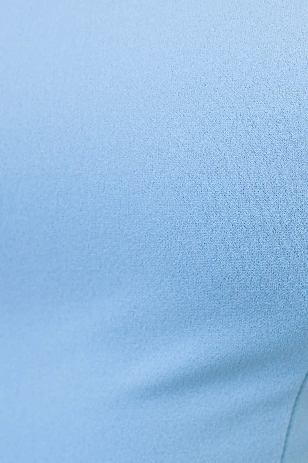 Close-up of soft blue fabric showcasing the texture of the Lizzie Midi Dress, perfect for a casual or formal occasion.