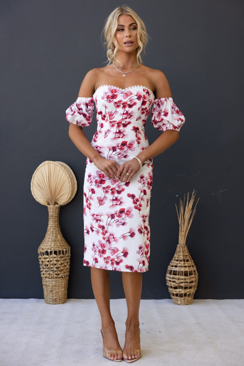 Flourish Midi Dress in floral print with off-shoulder neckline, elastic sleeve fittings, and side split.
