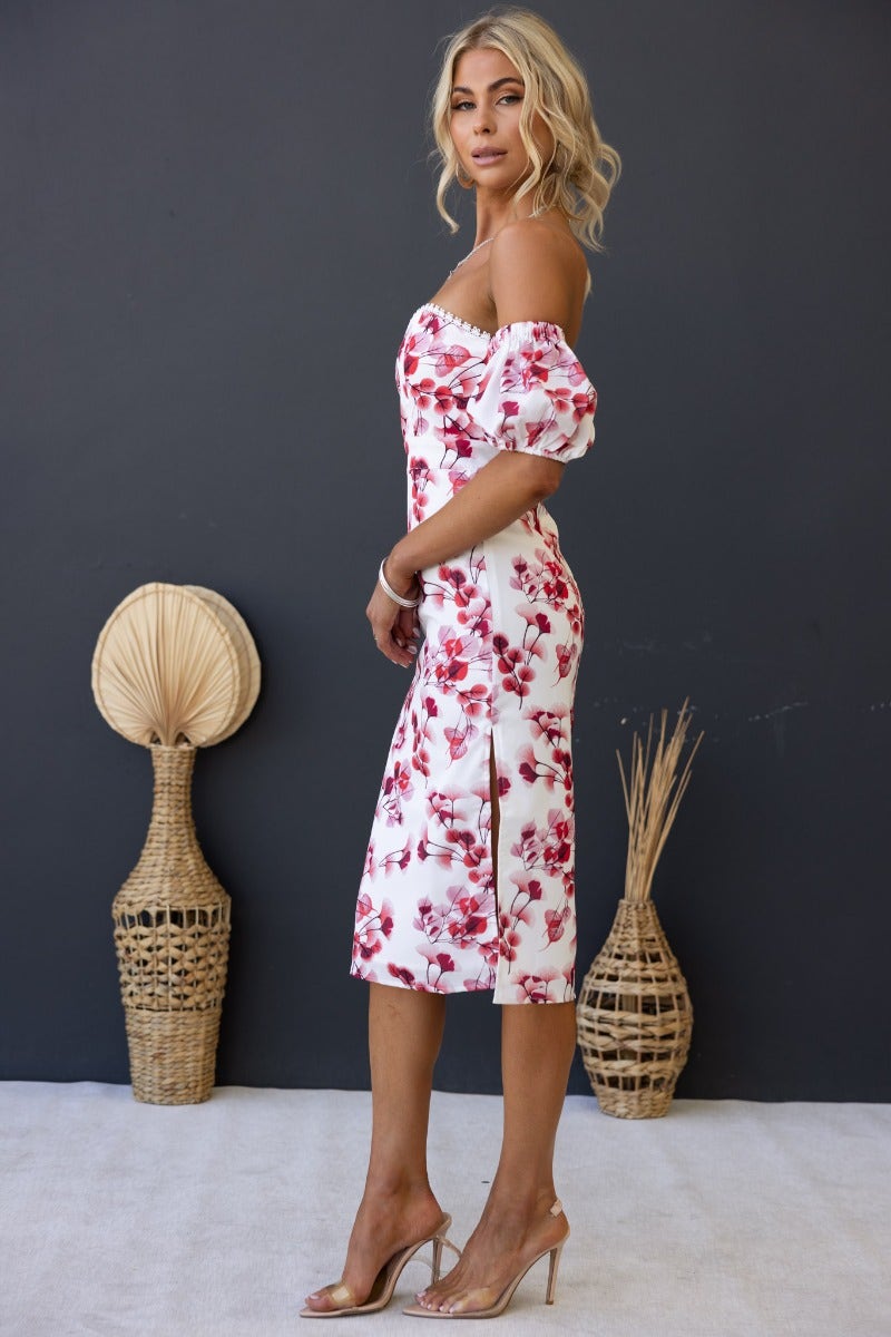 Off-shoulder floral print midi dress featuring elastic sleeves and side split, perfect for a stylish outing.