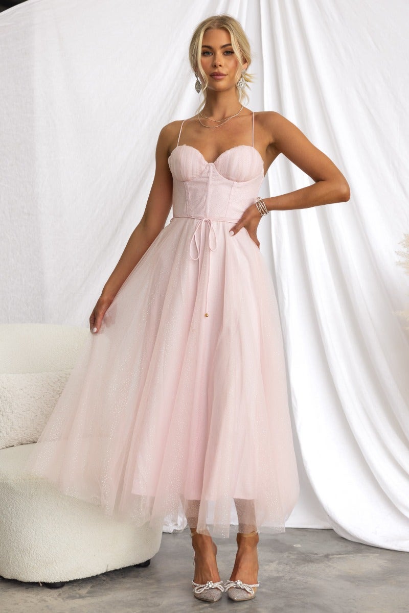 Florence midi dress in pink tulle with cross-over straps and removable belt, ideal for elegant occasions.