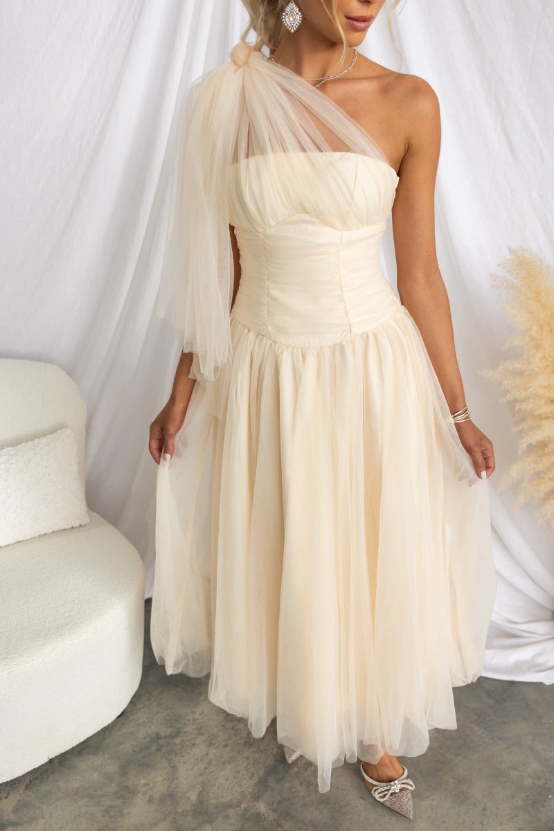 Elegant Belle Maxi Dress with tulle overlay and one-shoulder neckline in soft cream color.