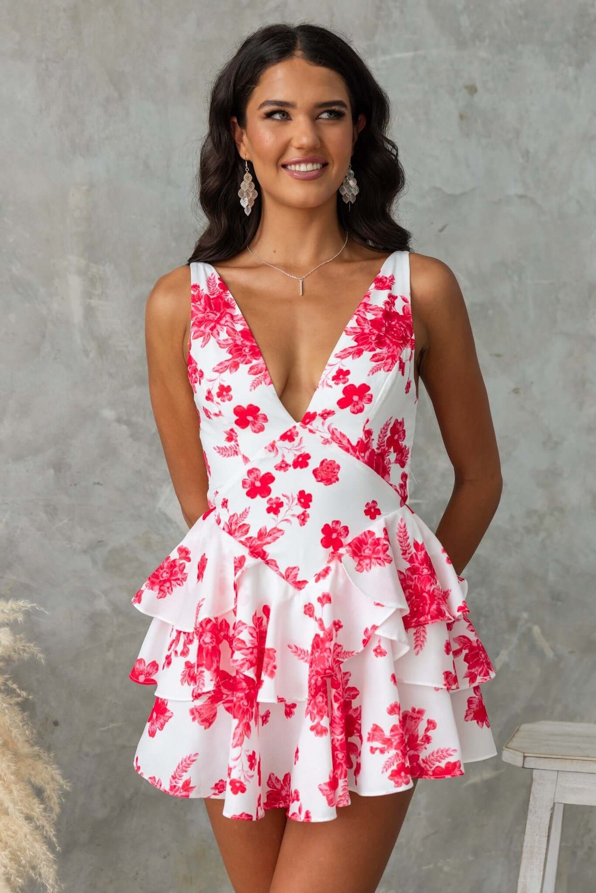 By Your Side Playsuit with floral design, adjustable straps, tiered ruffles, perfect for summer occasions.