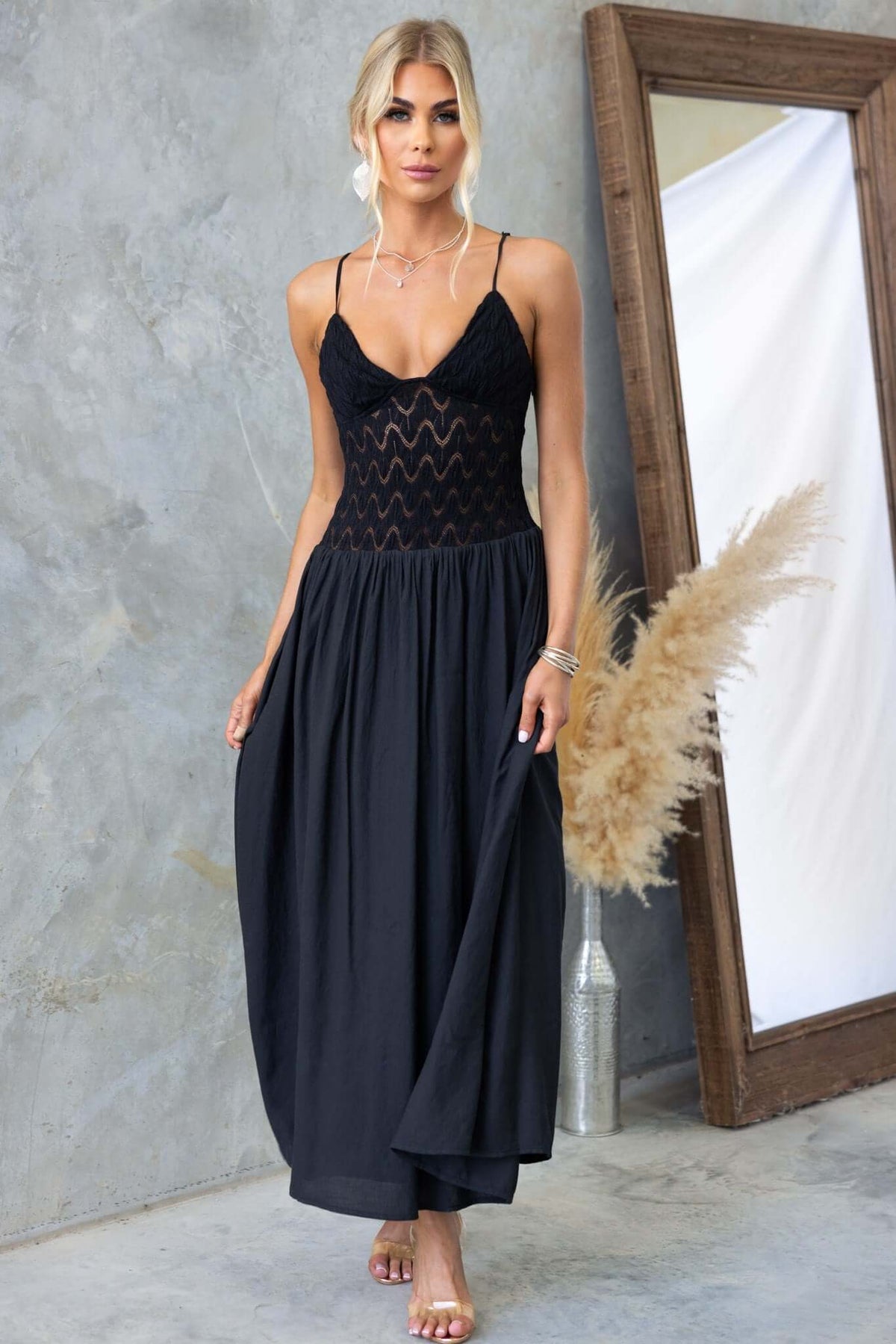 Thaisa Maxi Dress features a black lace bodice with adjustable straps and a flowing skirt, perfect for a stylish summer look.