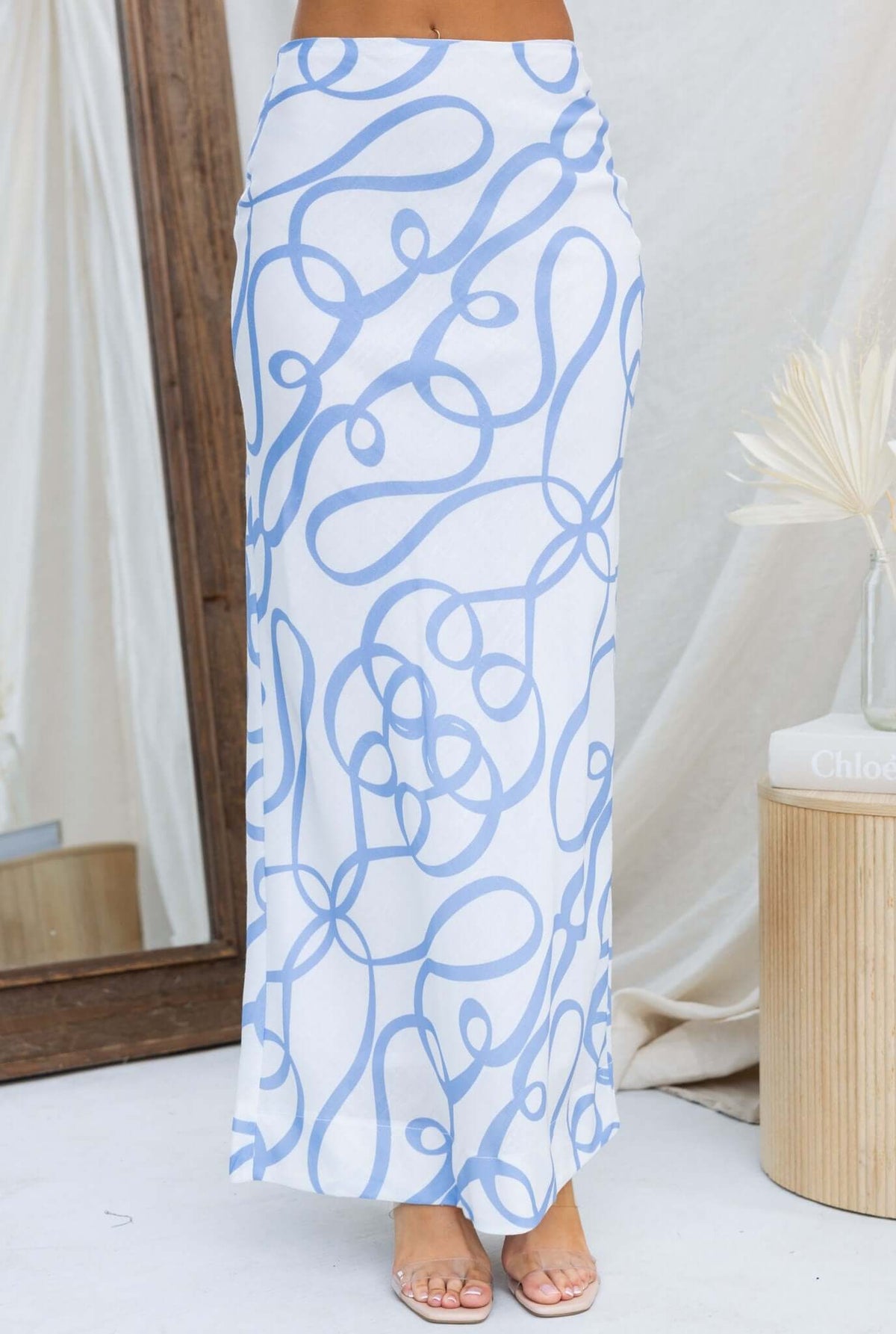 Bexley Maxi Skirt featuring a stylish blue pattern, mid-high waist fit, and a comfortable linen-like fabric.