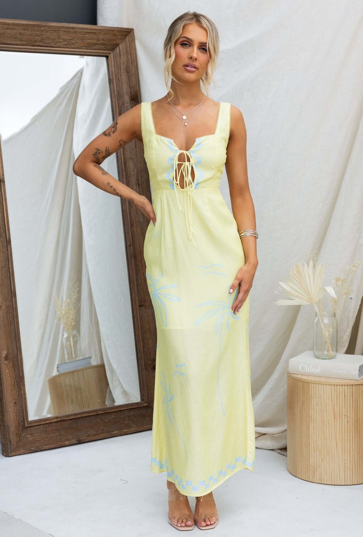 Norris Maxi Dress in yellow with tie detail, stylish and comfy, perfect for summer occasions.
