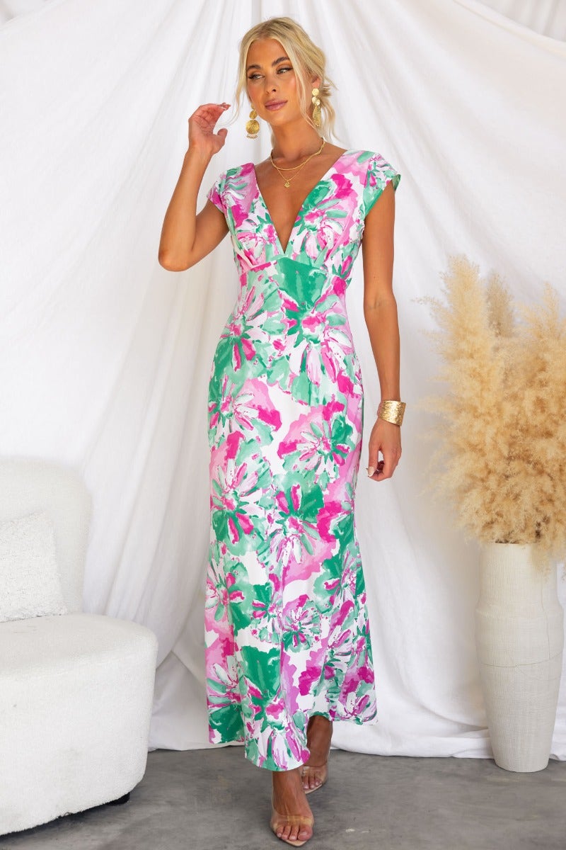 Live In Colour Maxi Dress featuring floral print, V-neckline, cap sleeves, and twist detail at back.