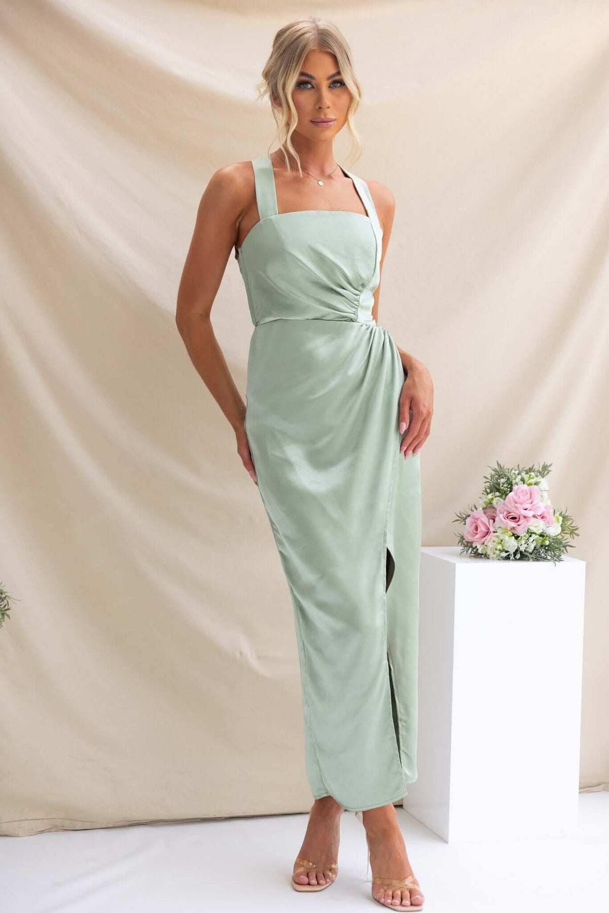Merritt Maxi Dress in mint green with adjustable tie straps and side slit, perfect for elegant occasions.