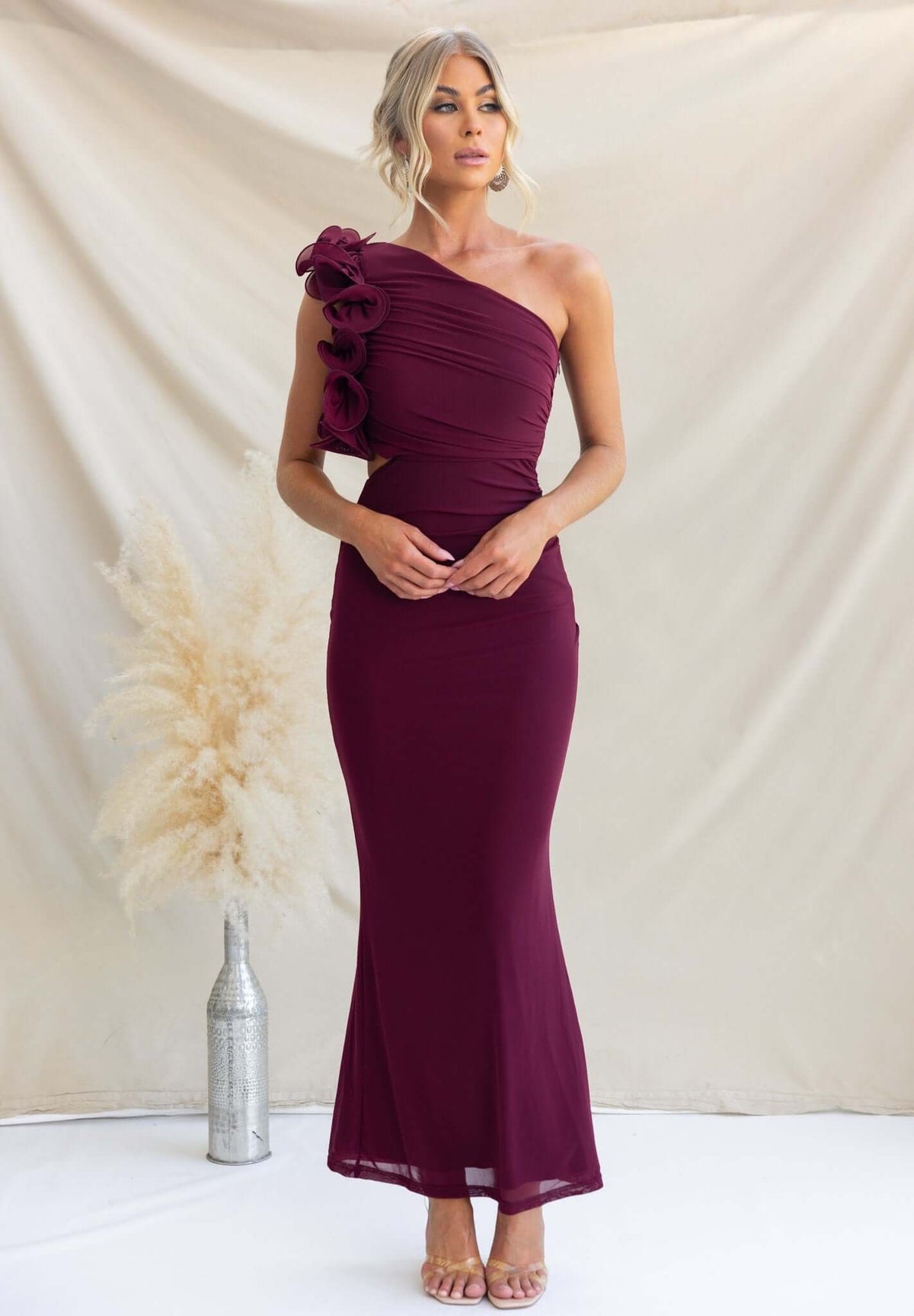 Meriden Maxi Dress in burgundy with one-shoulder design and floral detail, perfect for formal occasions.