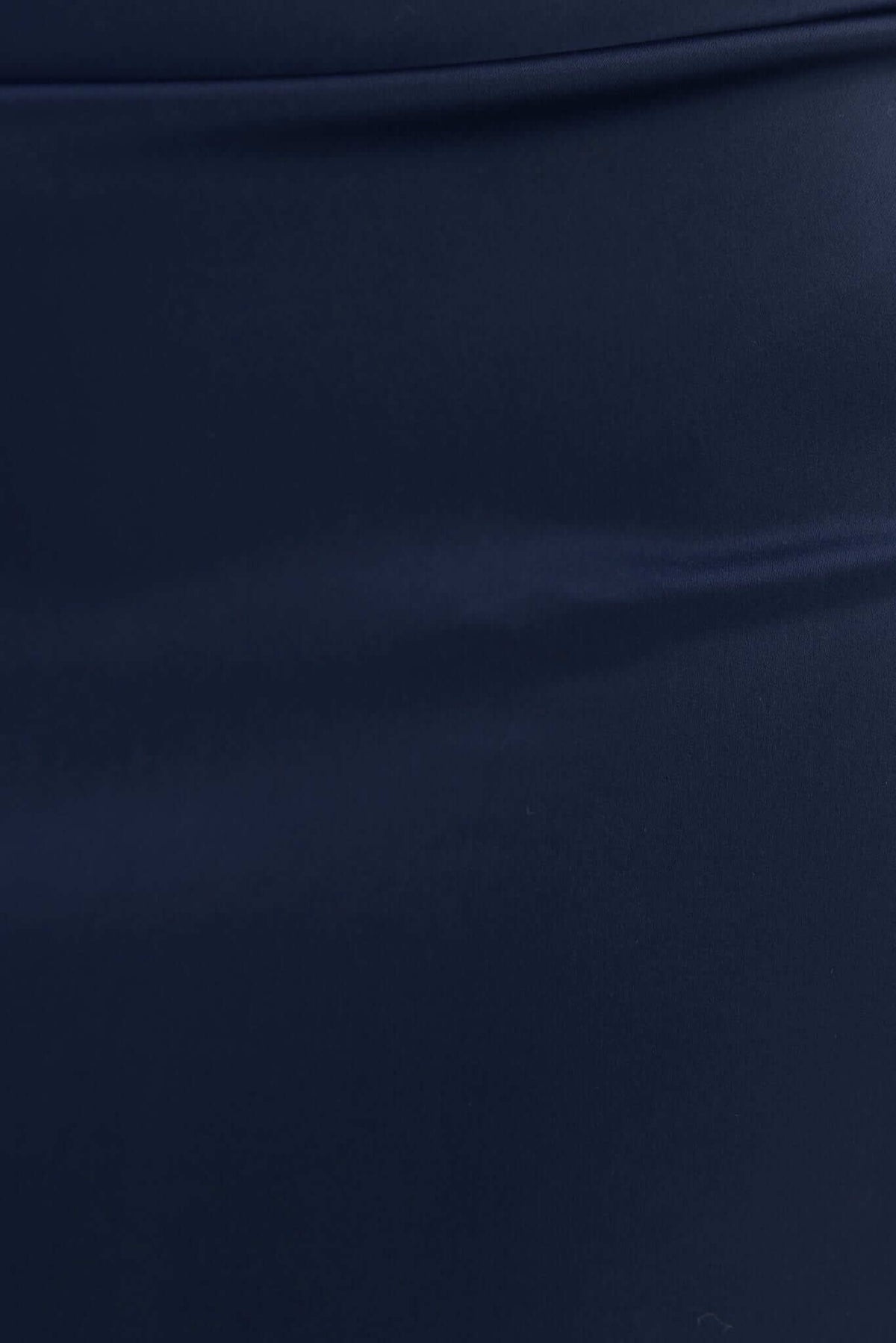 Close-up of the navy satin fabric of the Evianna Maxi Dress, showcasing its smooth texture and luxurious appearance.