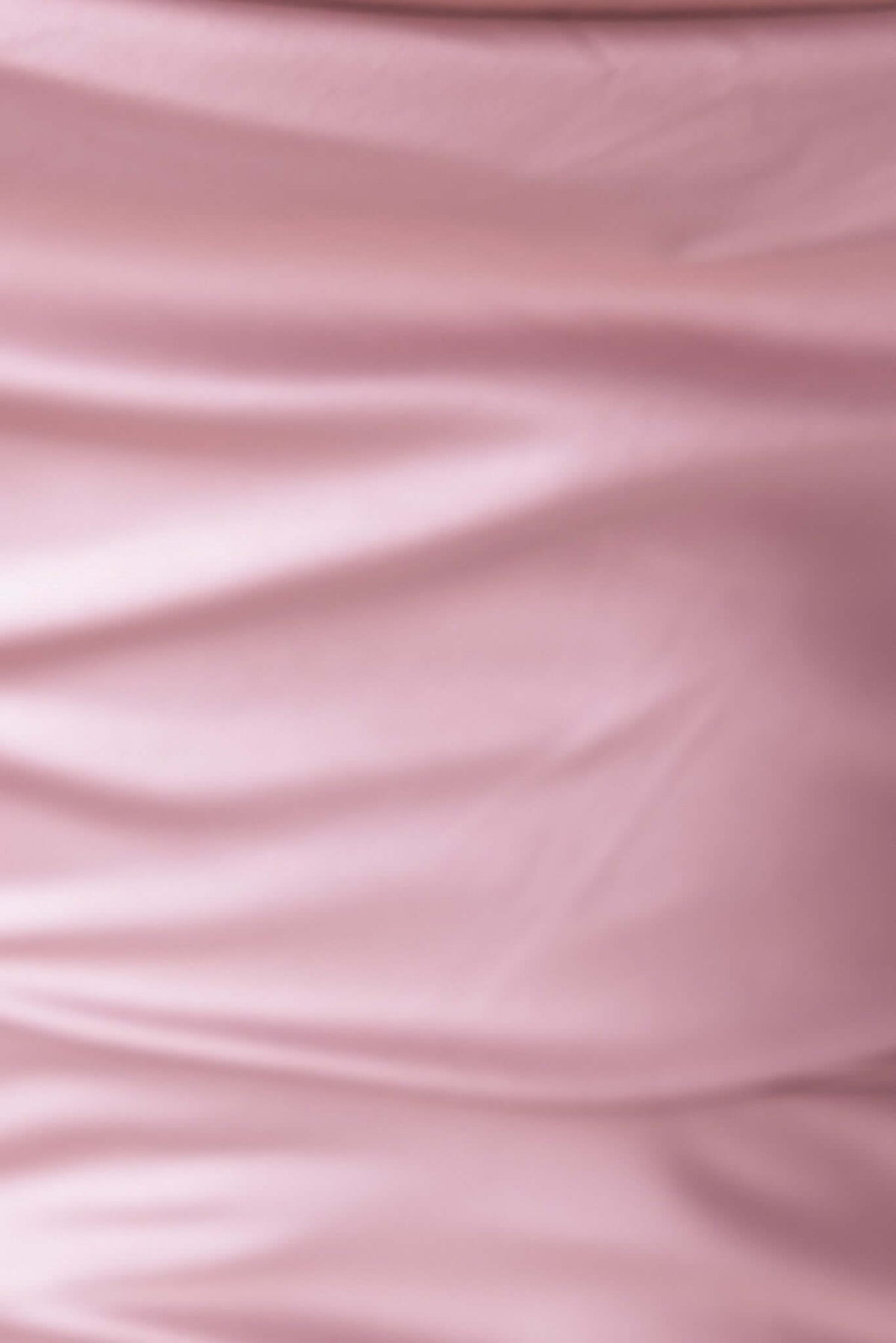 Close-up of soft pink fabric showcasing draping texture and elegance of Ingrid Maxi Dress.