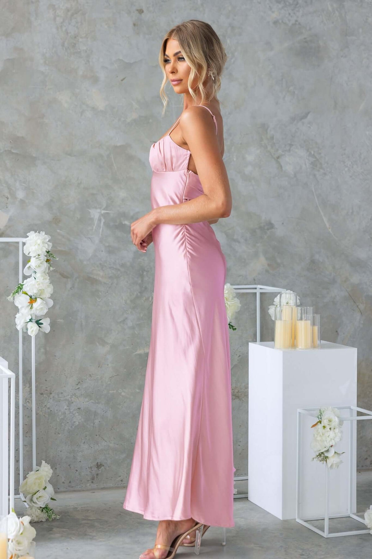 Elegant Maeya Maxi Dress in soft pink satin with adjustable straps and gathered bust, perfect for special occasions.