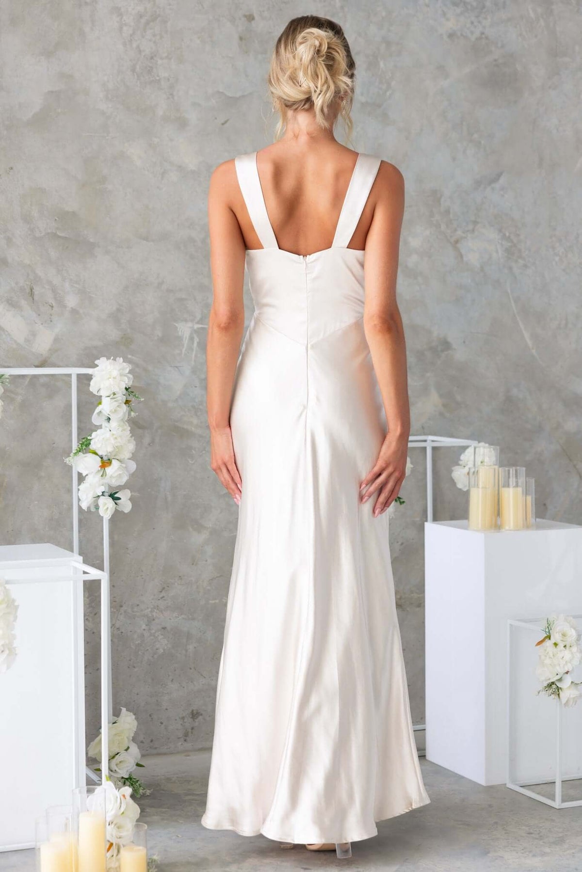 Back view of Darina Maxi Dress in satin, featuring wide straps and invisible zip, perfect for bridal events.