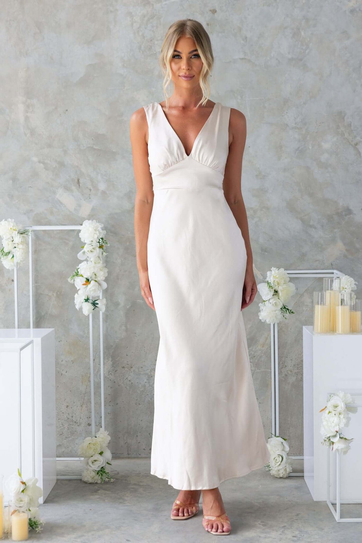 Elegant Alika Maxi Dress in satin with V-neckline, split back, and tie detail, perfect for special occasions.