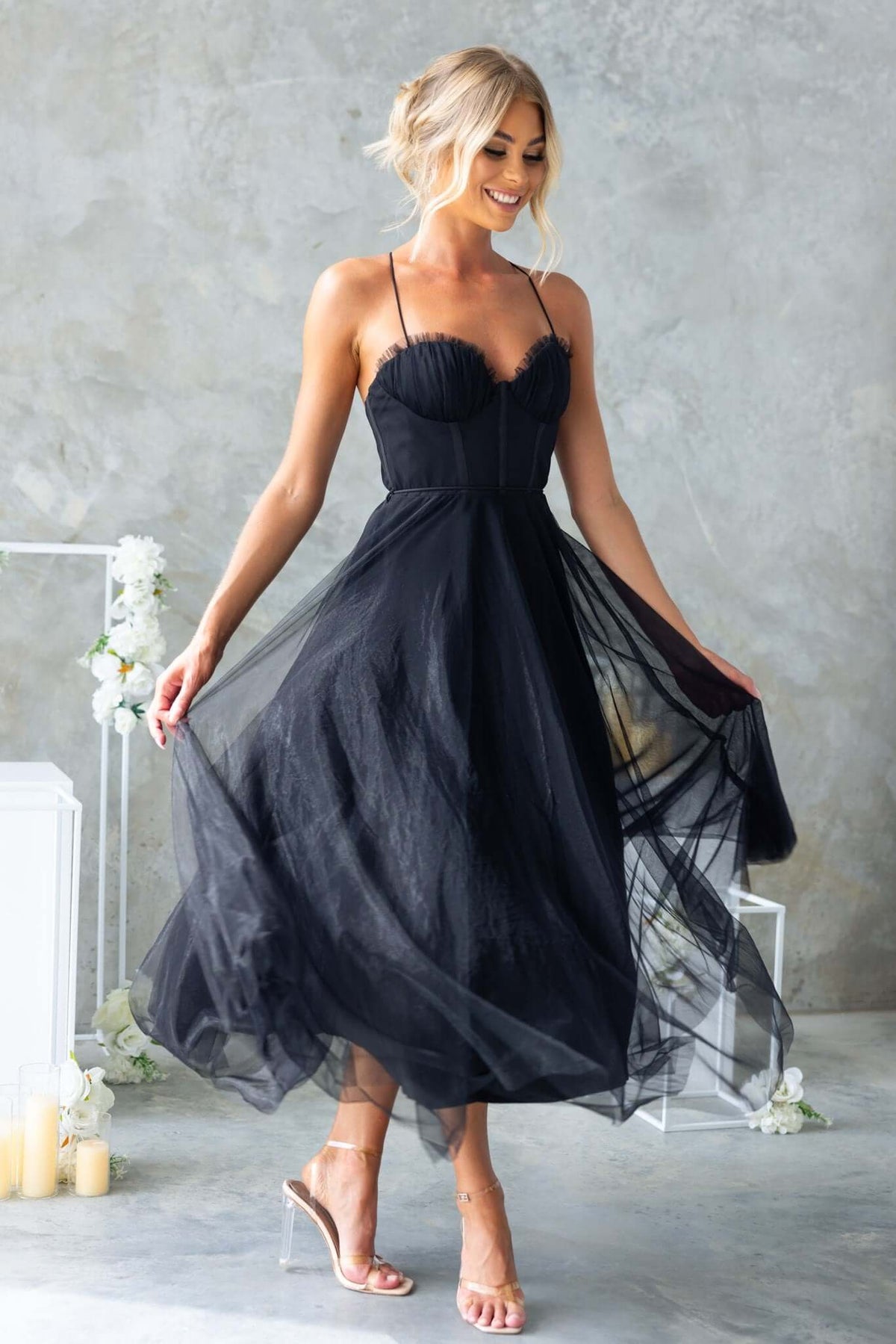Florence Midi Dress in black with adjustable straps and tulle skirt, perfect for elegant occasions.