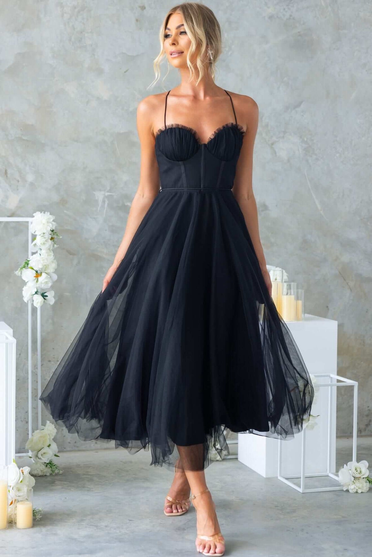 Florence Midi Dress in black, featuring adjustable straps, padded bust, and tulle material, perfect for bridal occasions.