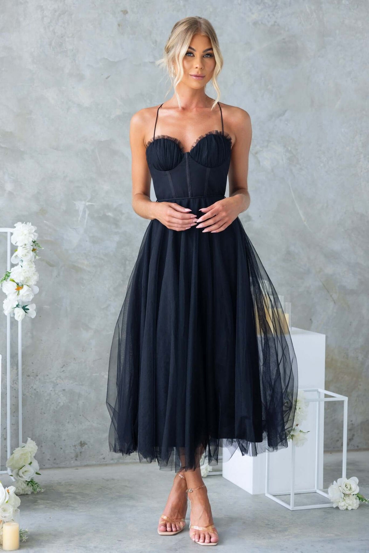 Florence Midi Dress in black with tulle skirt, adjustable straps, and padded bust, perfect for special occasions.