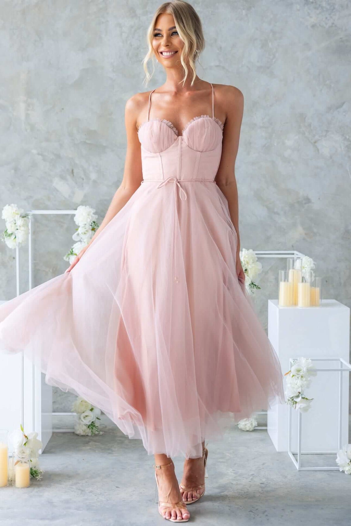 Florence Midi Dress in soft pink tulle with adjustable straps and removable tie, perfect for bridal occasions.