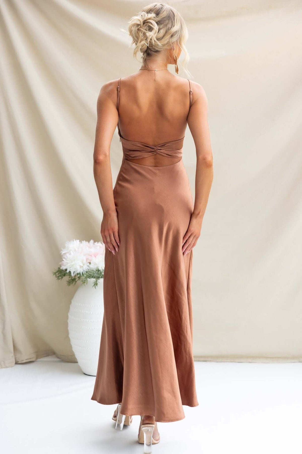 Elegant Maeya Maxi Dress in brown, showcasing adjustable straps and a stylish back cut-out.