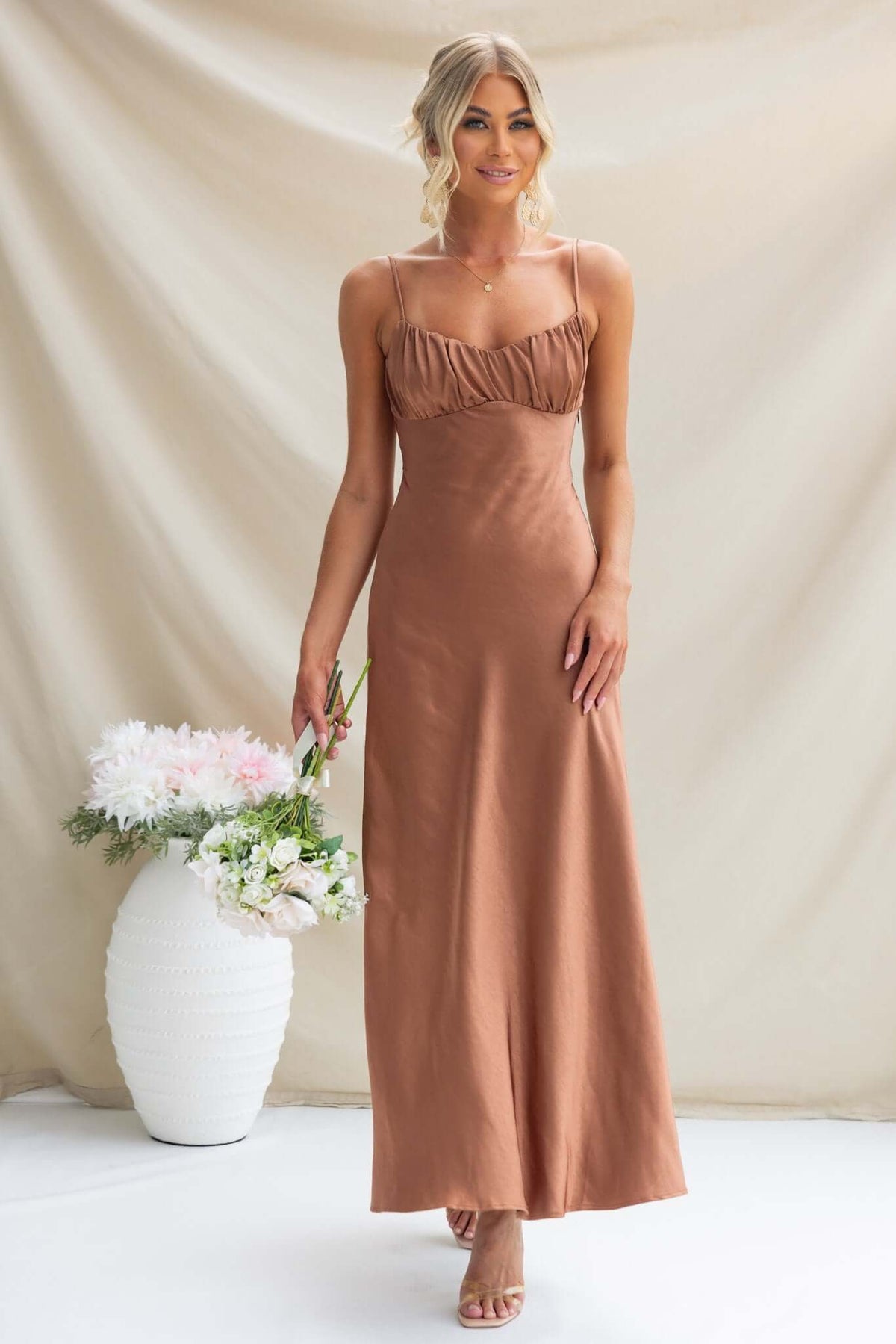 Elegant Maeya Maxi Dress in satin with adjustable thin straps and gathered bust detail, perfect for special occasions.