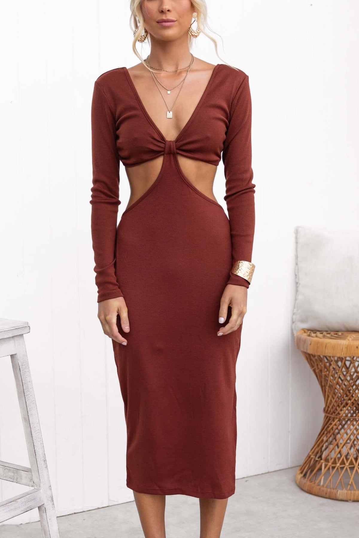 Cartier Midi Dress in rust with V-neckline and cut-out waist, perfect for stylish occasions and comfortable wear.