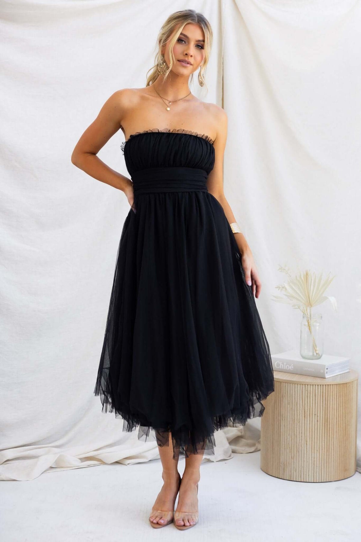 Sweetest Treat Maxi Dress in black with tulle overlay, strapless design, and padded bust, perfect for elegant occasions.