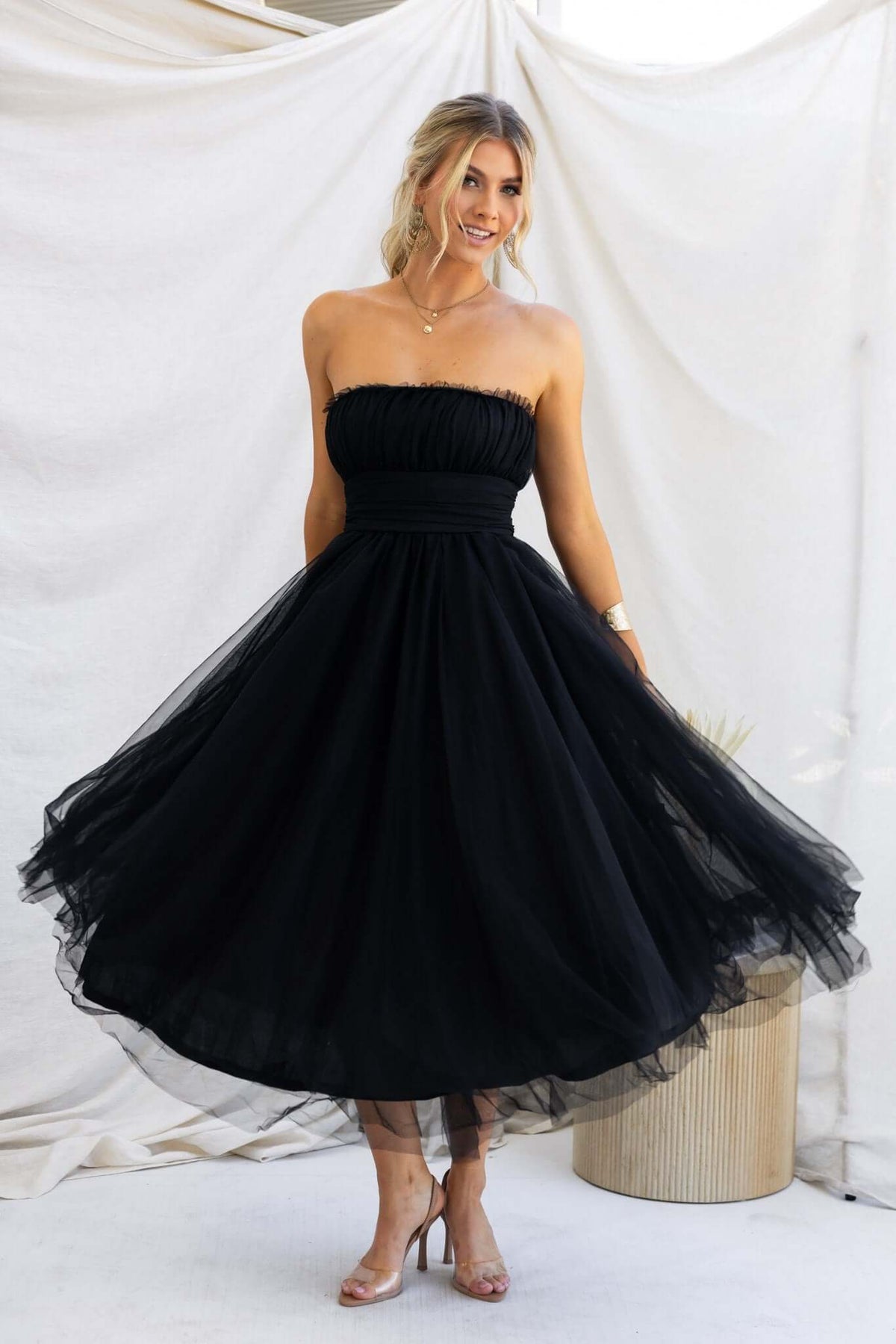 Sweetest Treat Maxi Dress in black tulle, strapless design with a flared skirt and invisible zip detail.