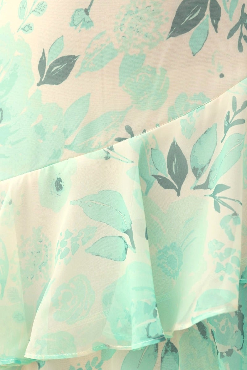 Saphina Top detail featuring mint floral print chiffon fabric with layered ruffle design.