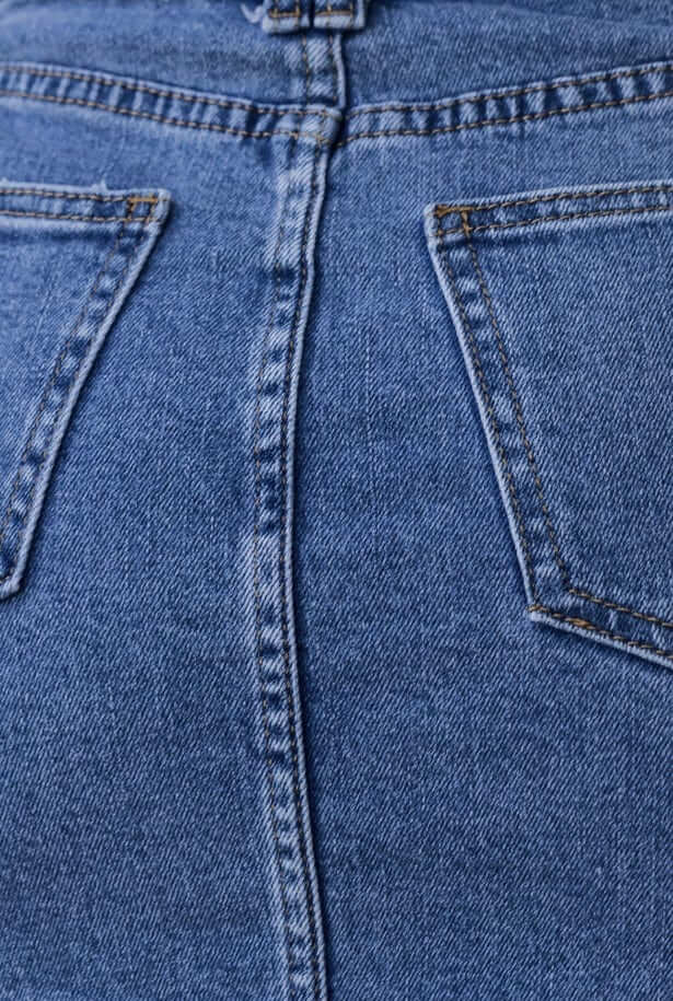 Close-up of the back view of a Rizzie denim skirt showcasing pockets and denim texture.