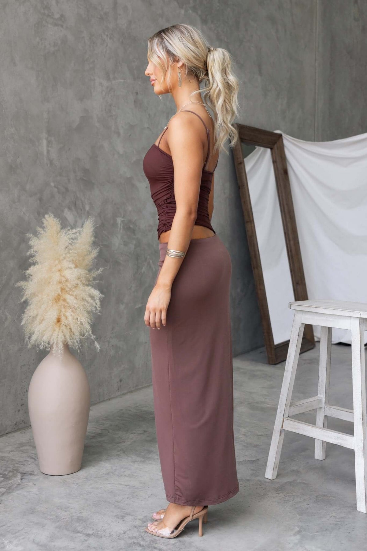 Side view of Denham Maxi Dress showcasing adjustable straps, square neckline, and cut-out waist detail.