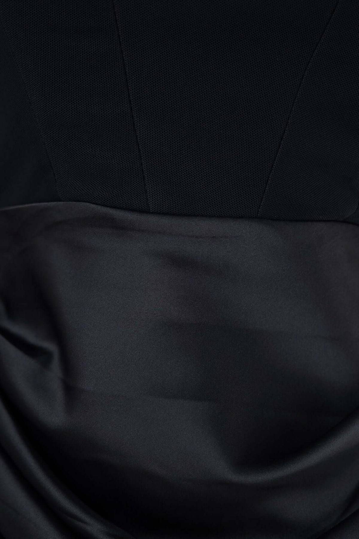 Close-up of the Atheni Maxi Dress detailing, showcasing the satin skirt and structured bodice.