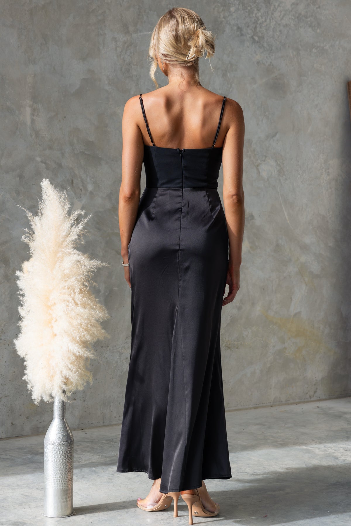 Back view of the Atheni Maxi Dress in satin, featuring adjustable straps and a sleek silhouette.