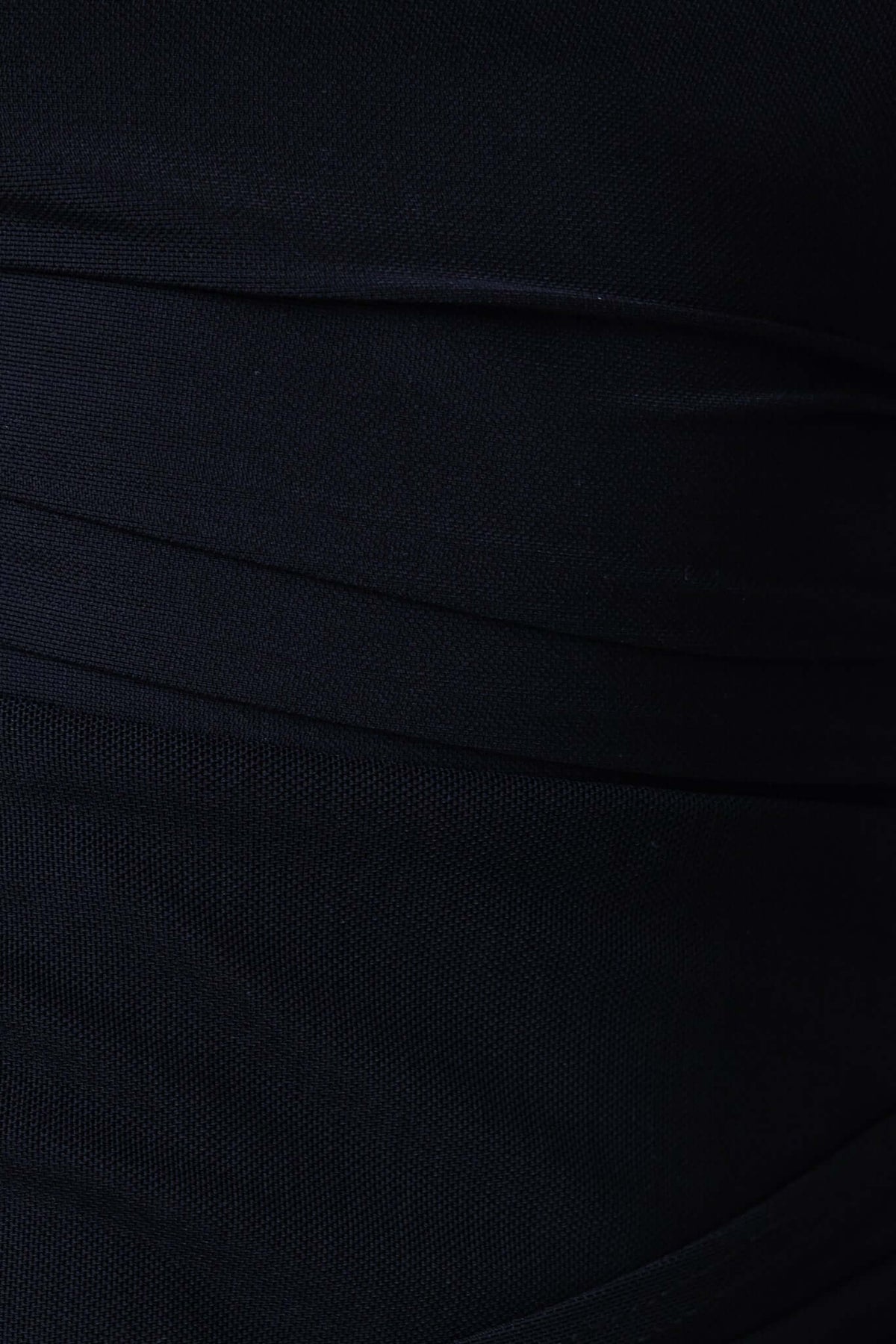 Close-up of the mesh material of the Ultra Maxi Dress showcasing the textured fabric and cut-out detail.