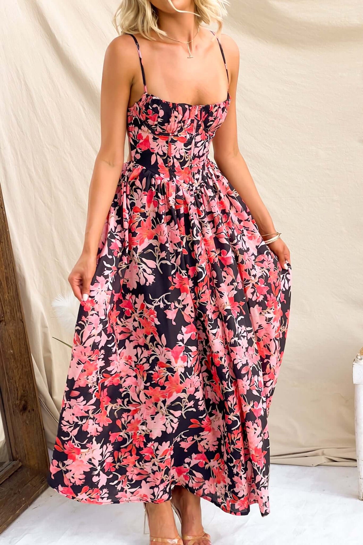 Floral Burkes Midi Dress with adjustable straps and boning detail, perfect for summer occasions.