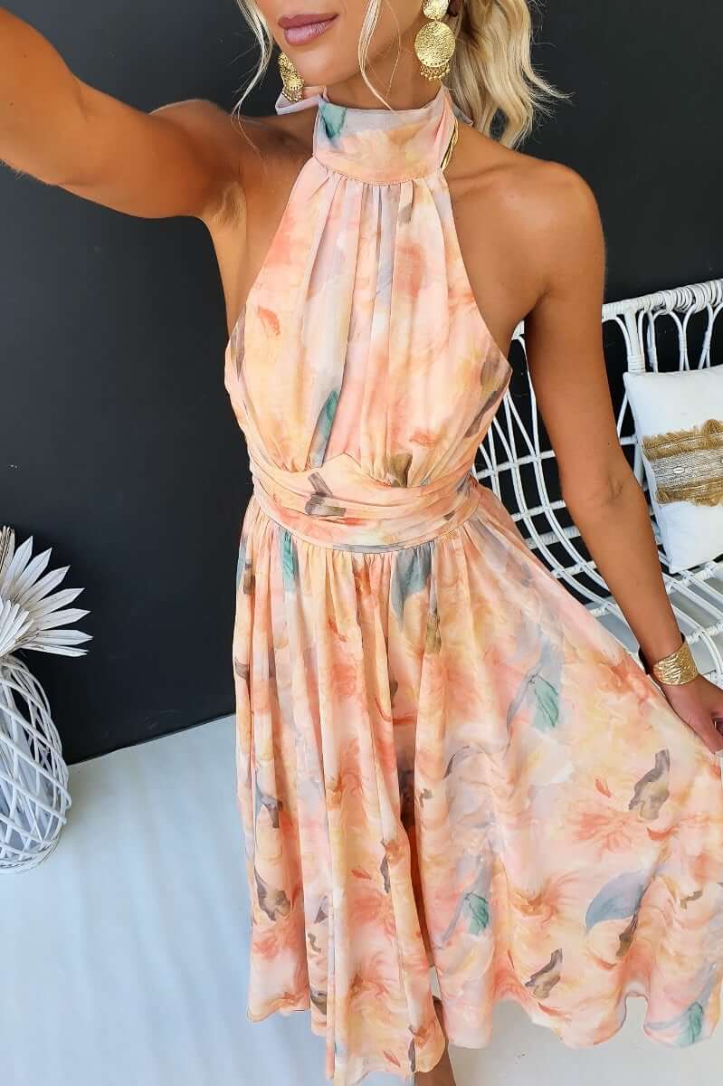 Floral print maxi dress with high tie neckline, perfect for casual outings and special occasions.