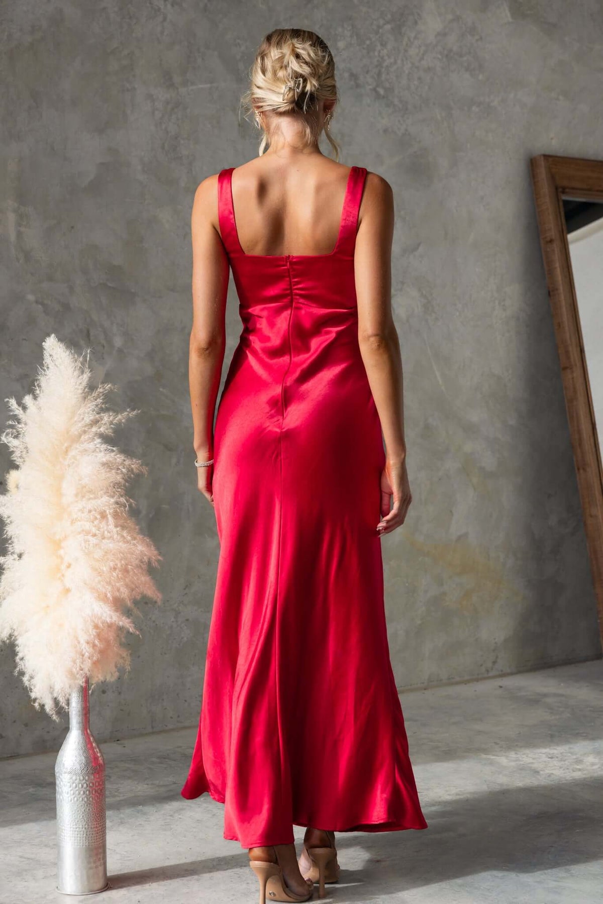 Fuego Maxi Dress in red satin with square neckline, showing back view and invisible zip, perfect for bridal occasions.