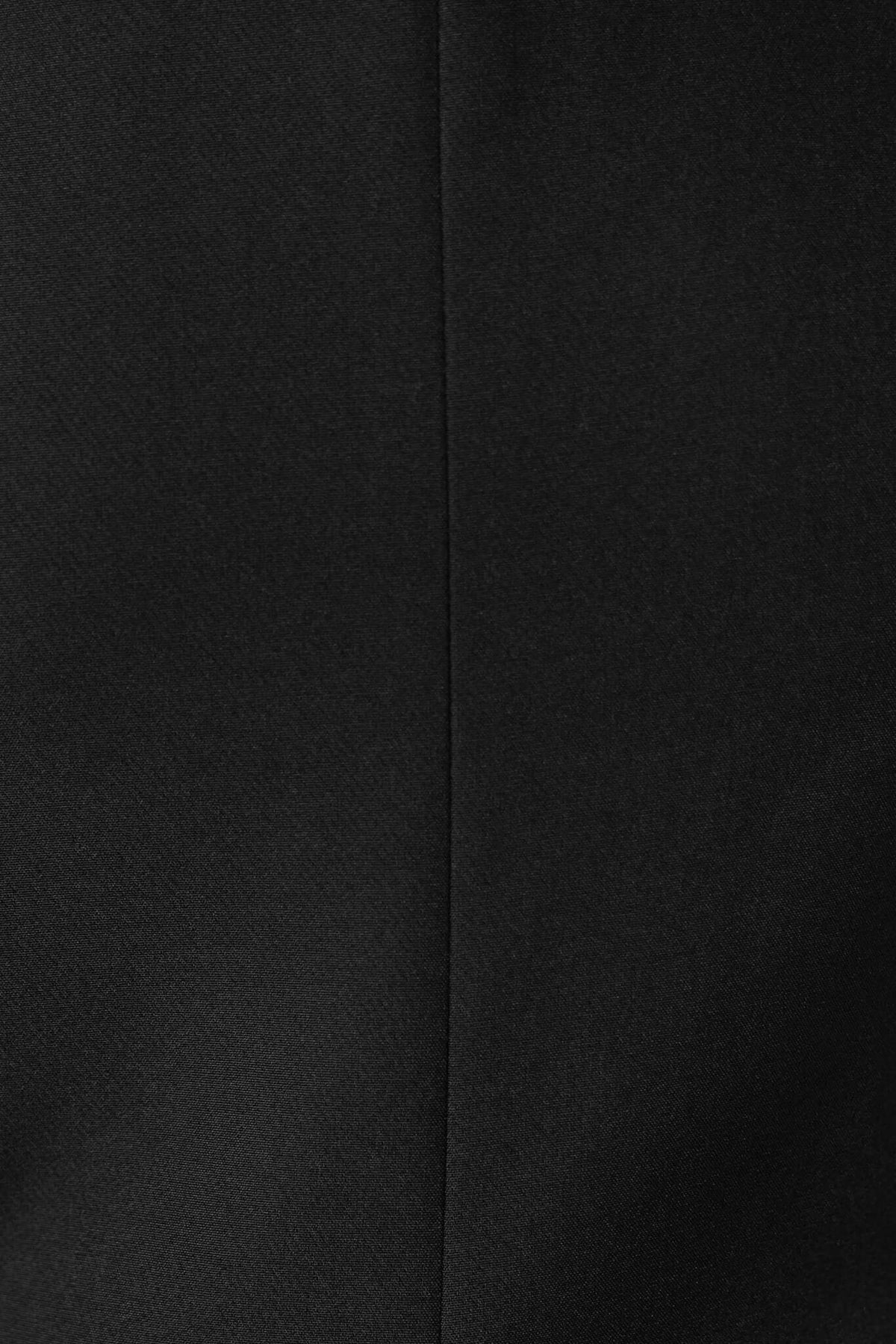 Close-up of the black fabric of Gette Pants, showcasing the sleek, non-stretch material and smooth texture.