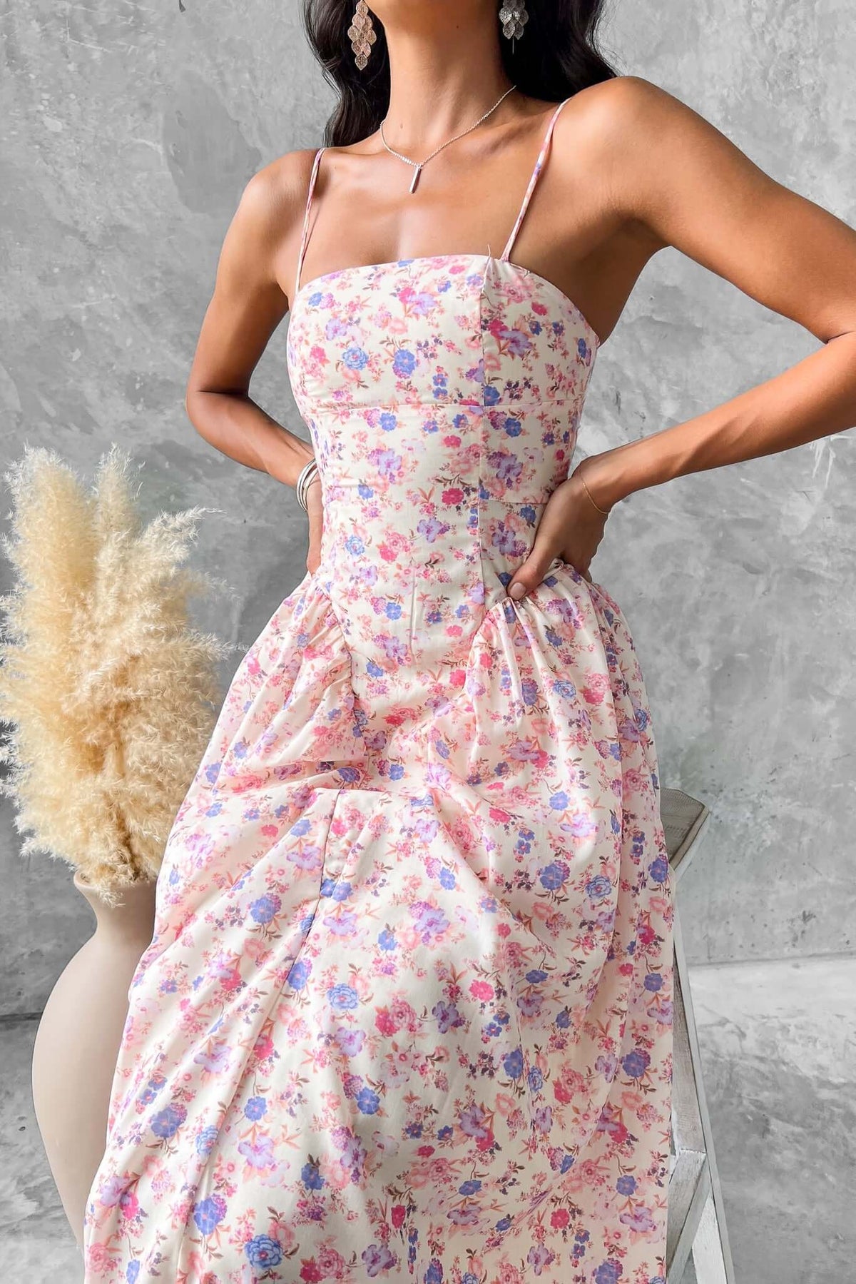 Othella Maxi Dress featuring adjustable straps and a floral pattern, perfect for summer outings.