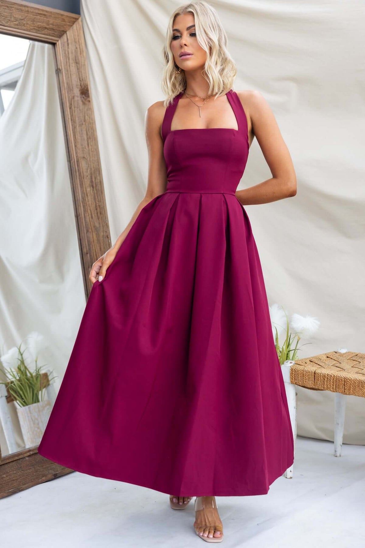 Jhene Maxi Dress in deep burgundy, featuring a fitted bodice and flowing skirt, perfect for elegant occasions.