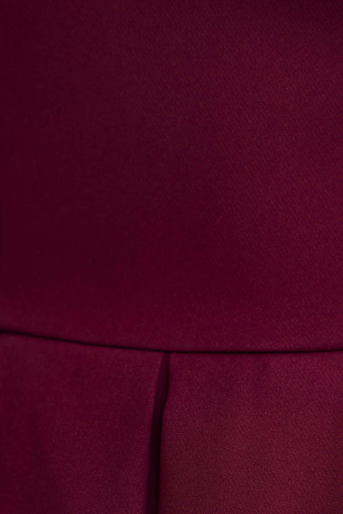 Close-up of burgundy maxi dress fabric showcasing a smooth texture and pleated detail.
