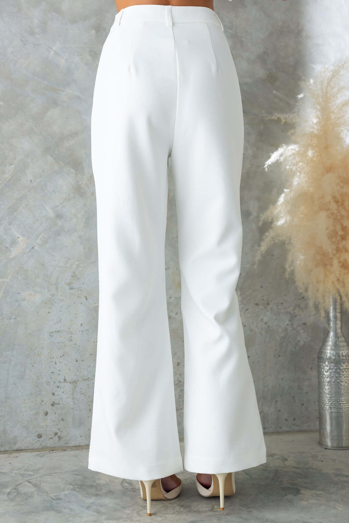 Back view of Josefina pants in white, mid-high waist fit, lined, non-stretch, perfect for stylish occasions.